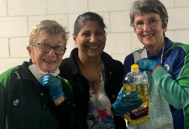 Julie Davis with Blowfly Cricket Volunteers, Smiling